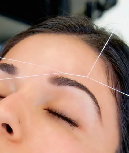 eyebrow threading waxing beauty salon woman